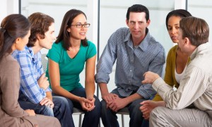 group-of-people-in-therapy-talking